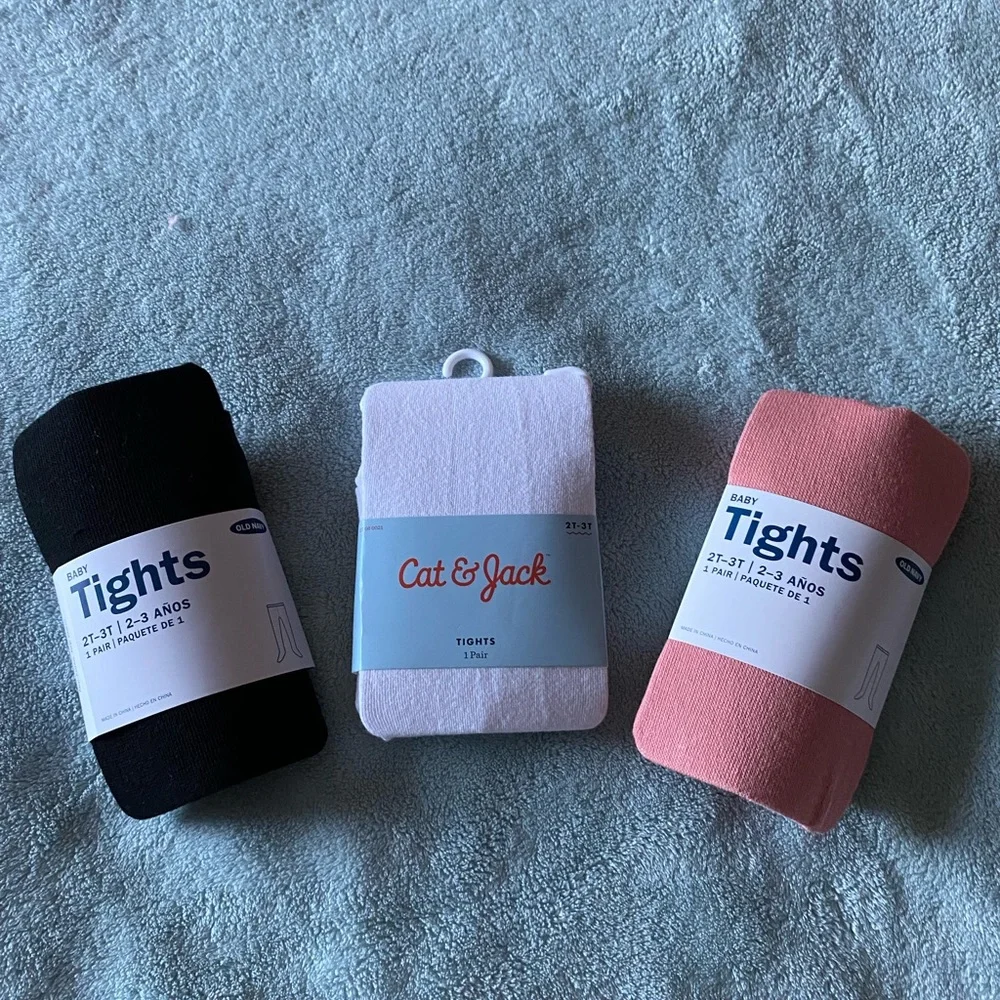 Toddler Pink, white, and black tights